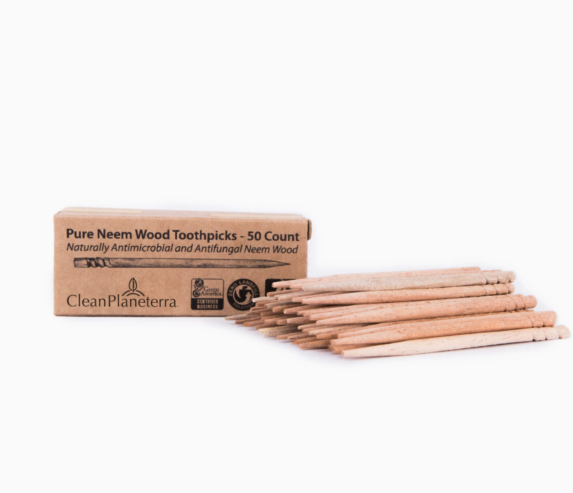 Box of Pure Neem Wood Toothpicks with toothpicks spilling out on a white background