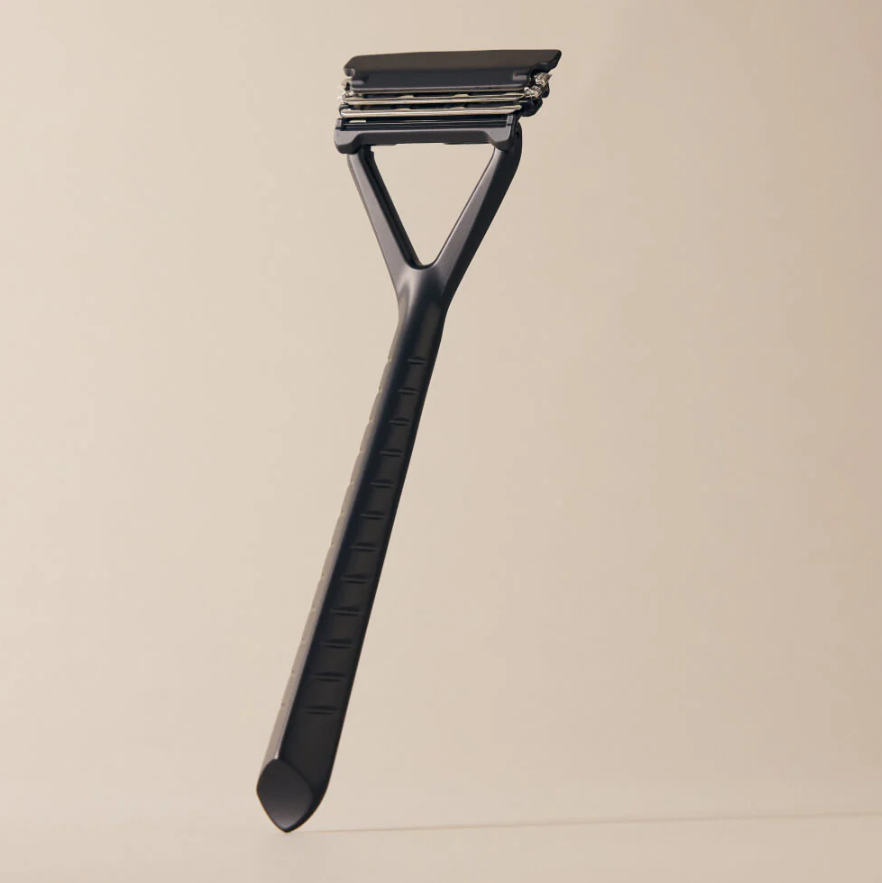 RAZOR WITH PIVOTING HEAD