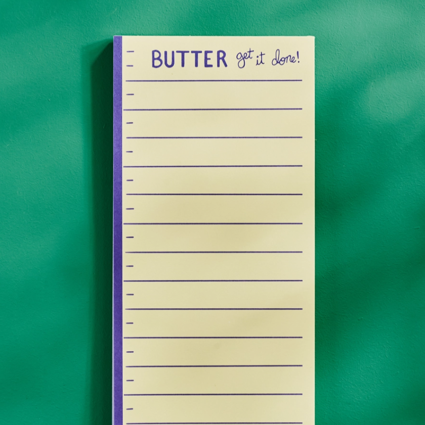 Notepad with 'BUTTER get it done!' text on a green background