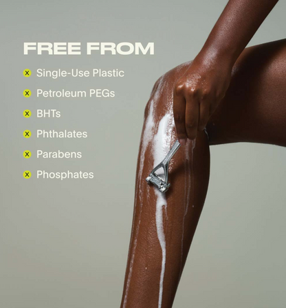 A close-up of a person shaving their leg with shaving foam, alongside text that reads 'FREE FROM' listing ingredients such as single-use plastic, petroleum PEGs, BHTs, phthalates, parabens, and phosphates.