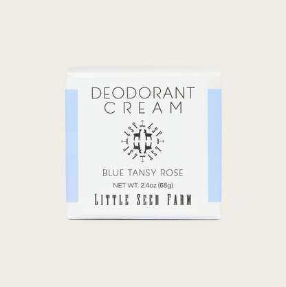 Deodorant cream packaging with 'Little Seed Farm' branding on a light background