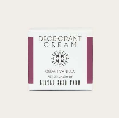 Deodorant cream packaging with 'Little Seed Farm' branding on a light beige background