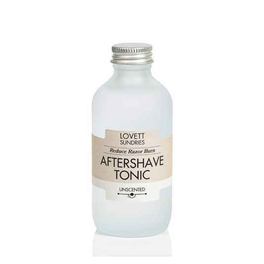 Bottle of Lovett Sundries Aftershave Tonic on a white background