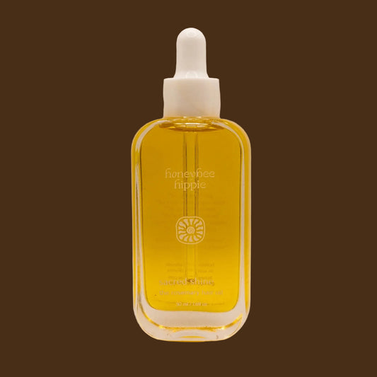Bottle of honeybee hippie product on a beige background