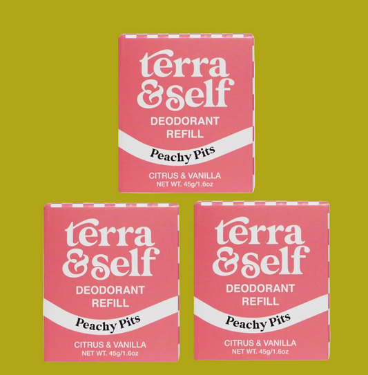 Three pink Terra & Self deodorant refill boxes arranged in a triangle on a white background. The boxes are labeled 'Peachy Pits' and 'Citrus & Vanilla'.