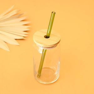 DRINKING GLASS WITH STRAW